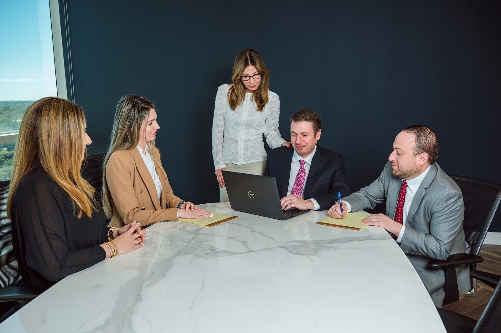 Business team meeting around conference tableRetry