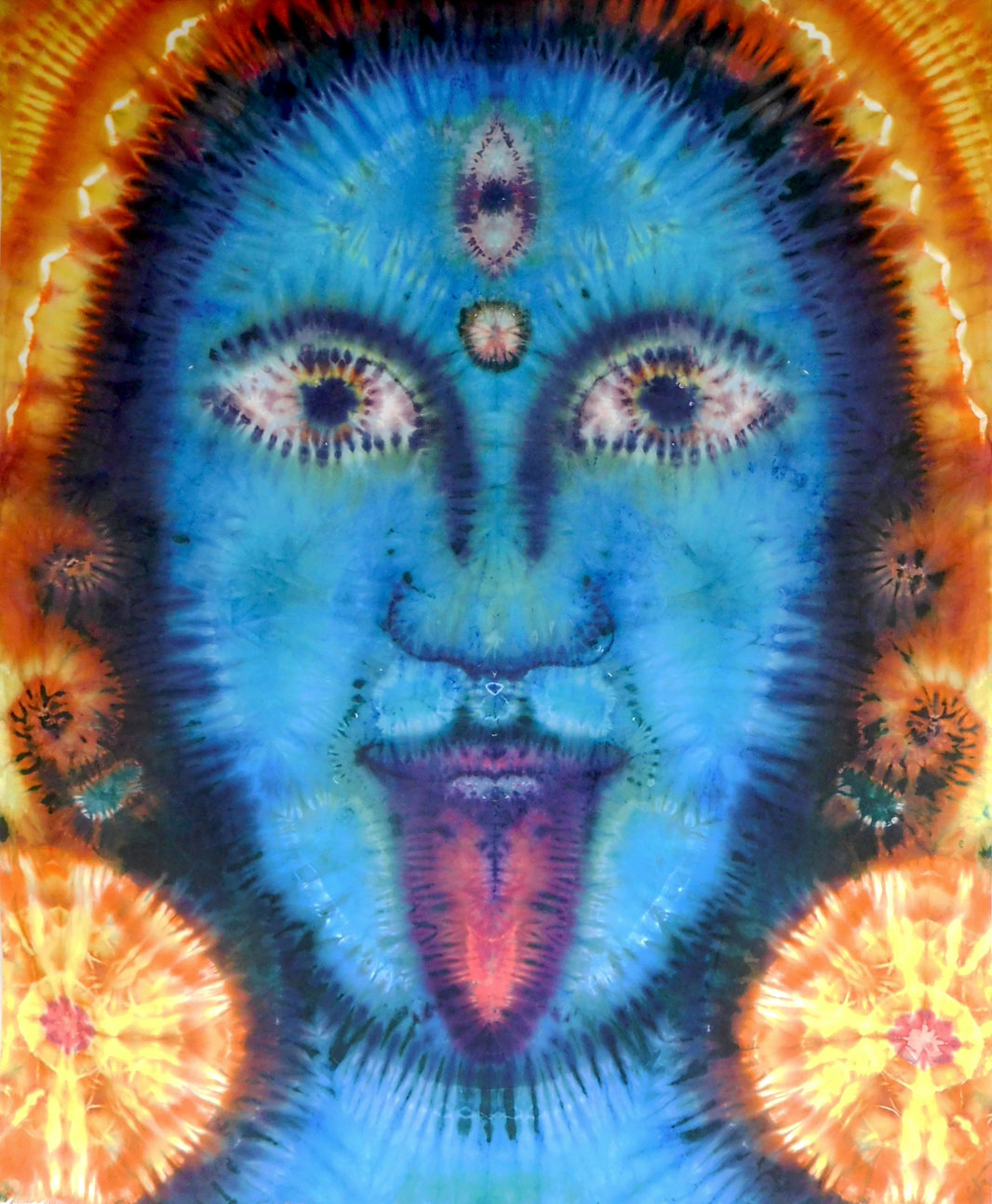 Colorful tie-dye pattern with a face-like design, featuring eyes, nose, mouth, and a third eye on the forehead.