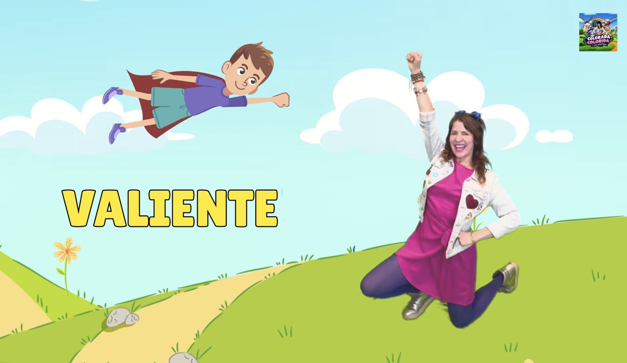 Child flying with a superhero cape and woman jumping on grassy hill with sky background.