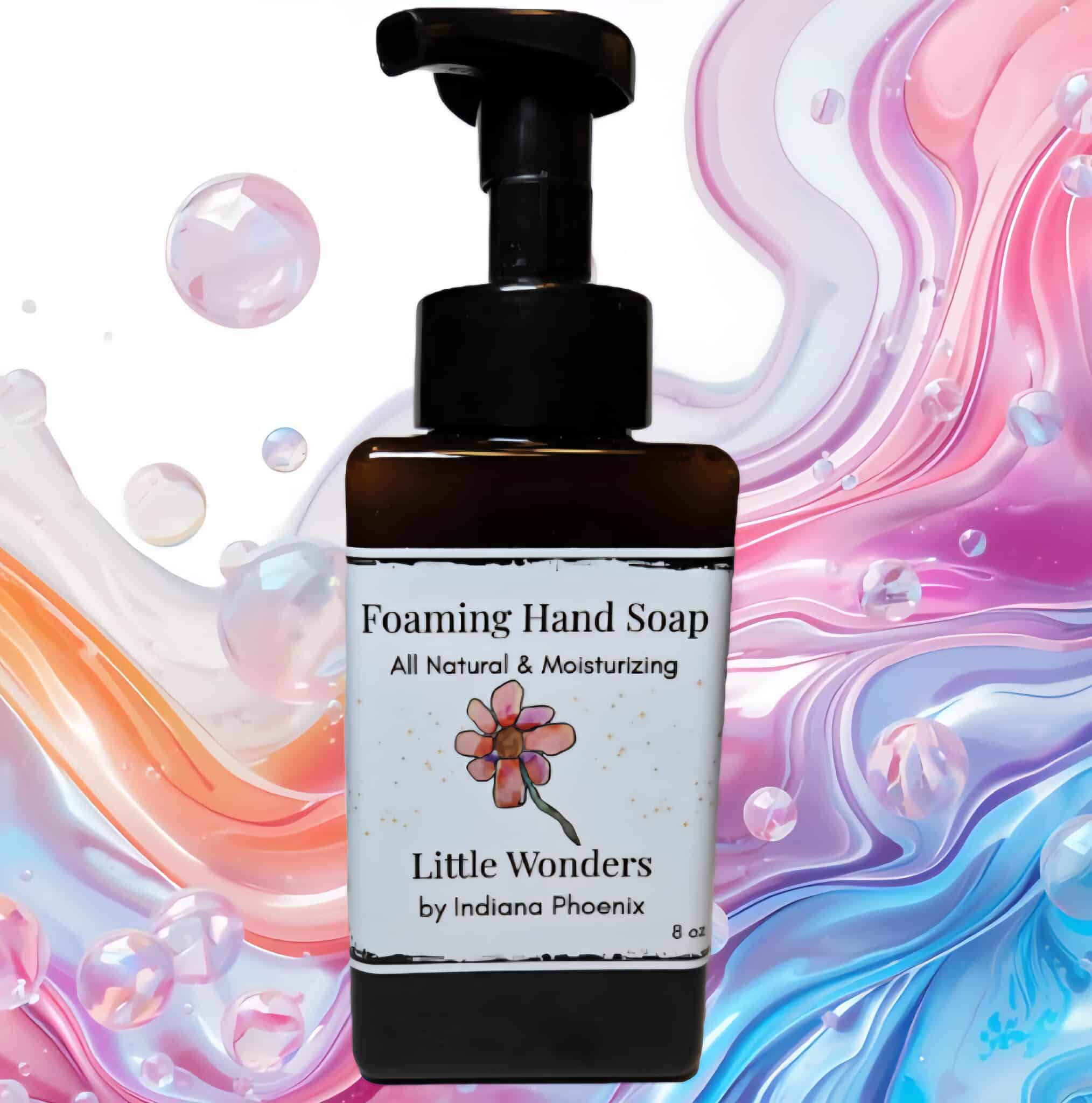 Black pump bottle of foaming hand soap with pink, blue, and white swirls background.