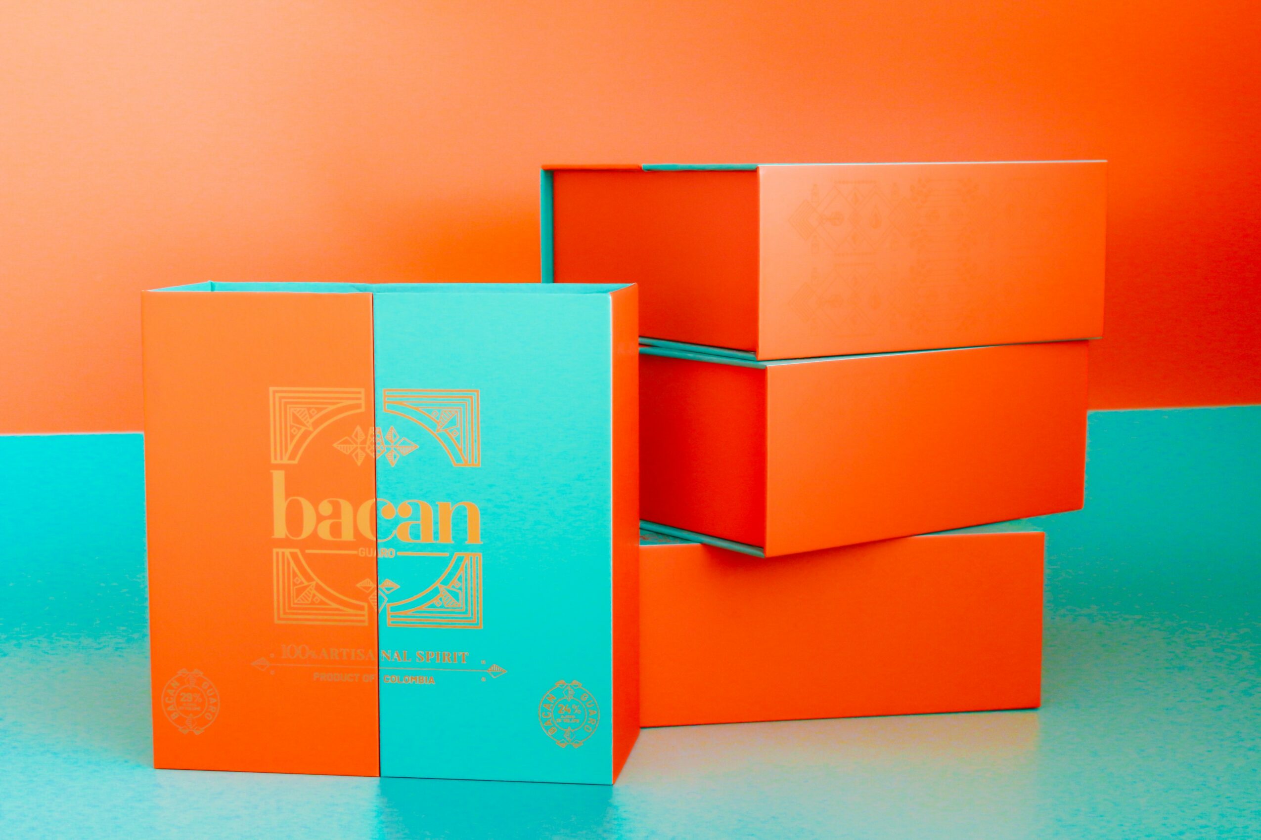 Four stacked orange boxes with a blue box in front, set against an orange and teal background.
