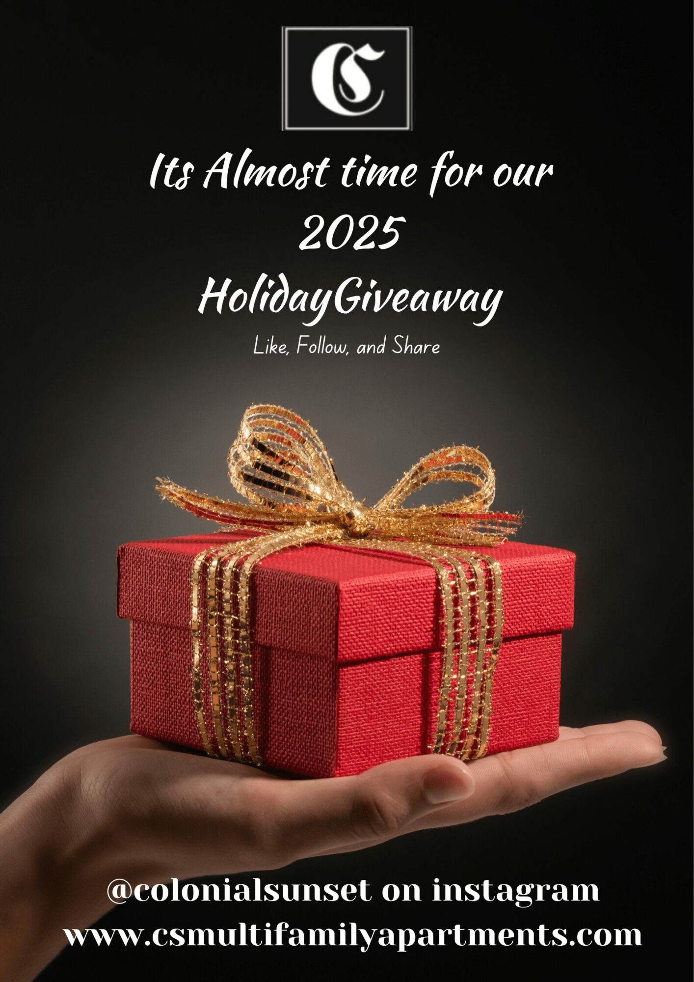 Hand holding a red gift box with gold ribbon, black background, promotional text for 2025 holiday giveaway.