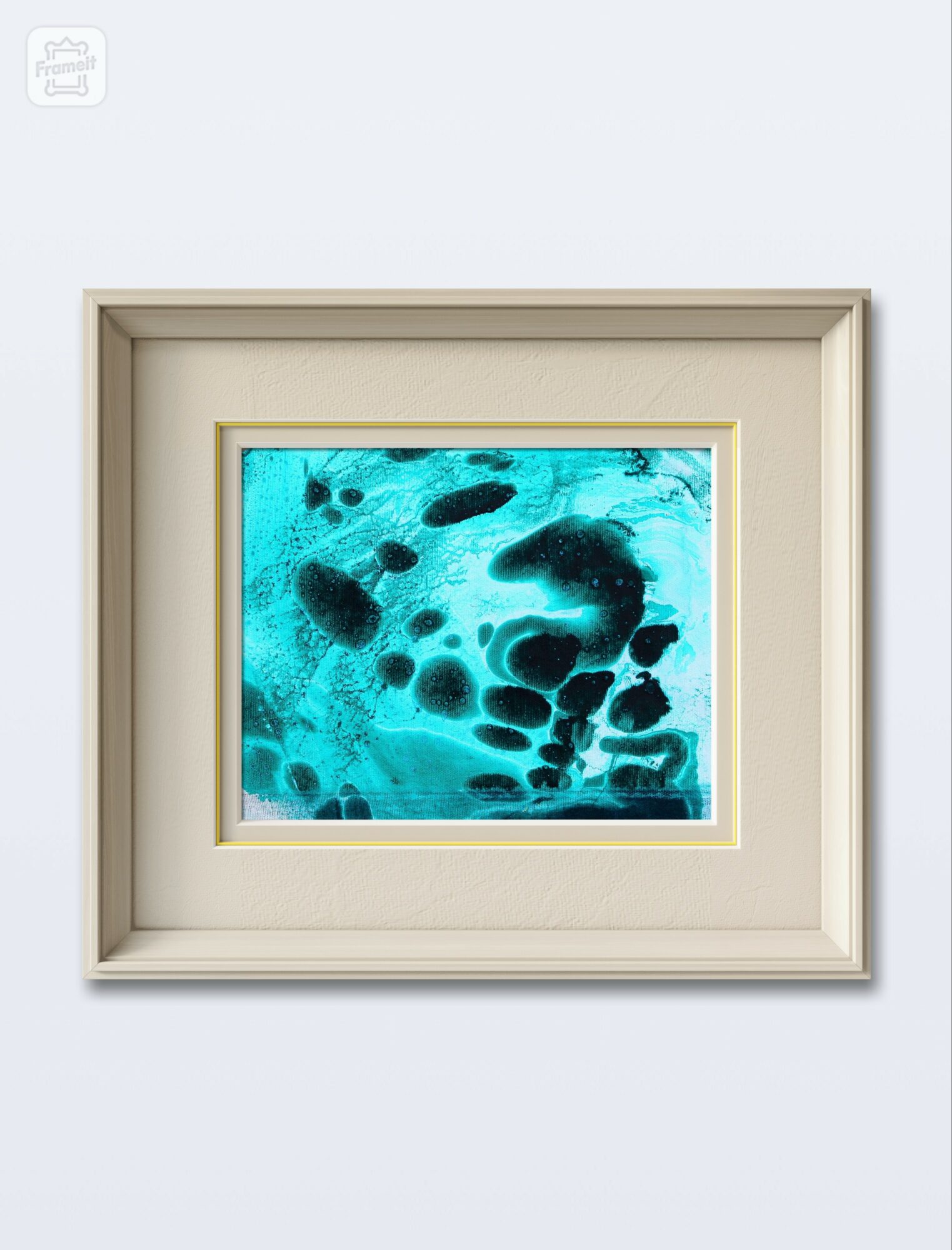 Framed abstract artwork with blue and black organic shapes on a light background.