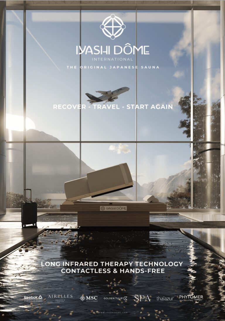 Interior view of a spa with a large window showing mountains and sky, a floating tray, and a pool, promoting infrared therapy.