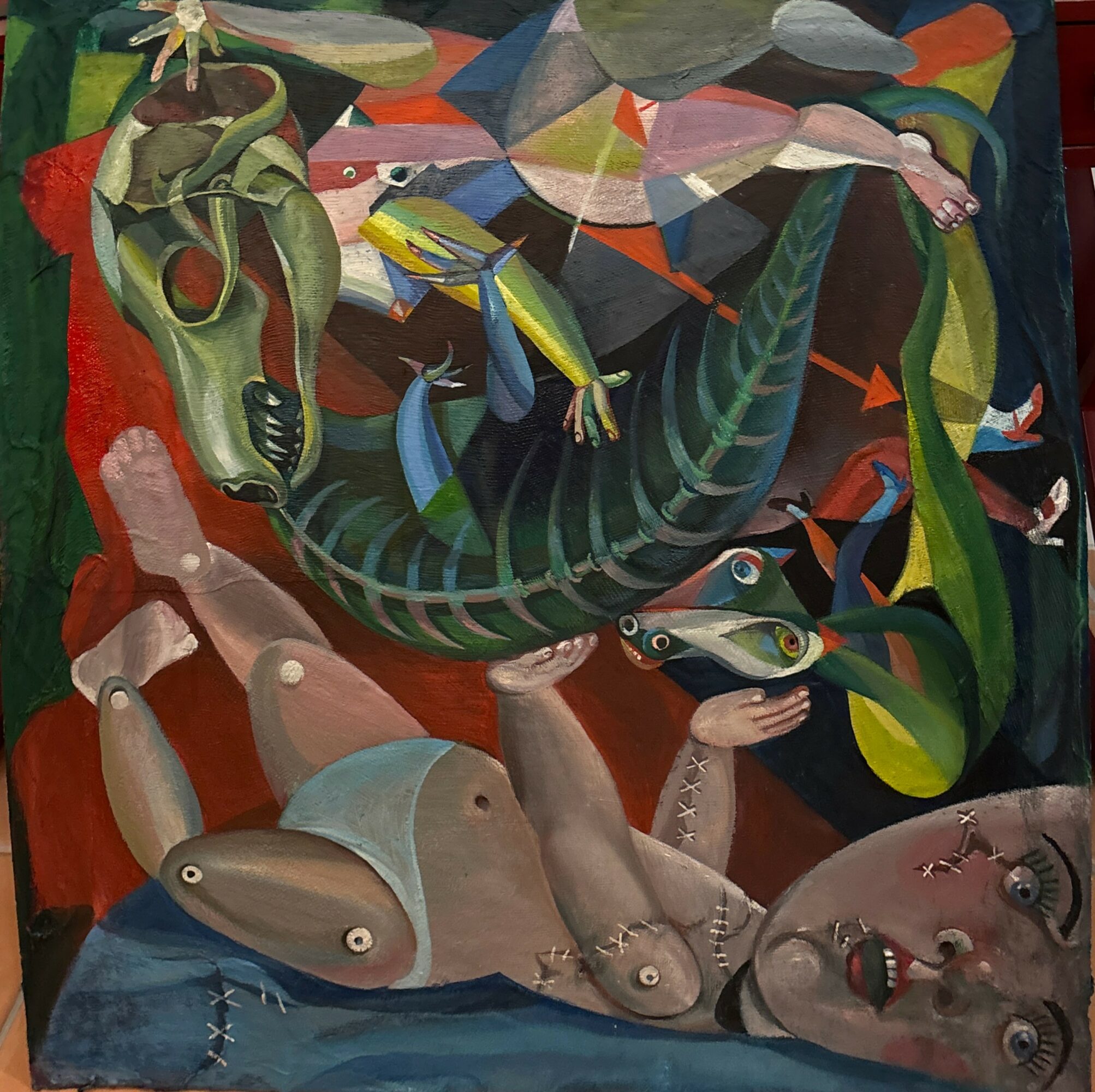 A surreal painting with a distorted human face, a snake, and abstract shapes and colors.
