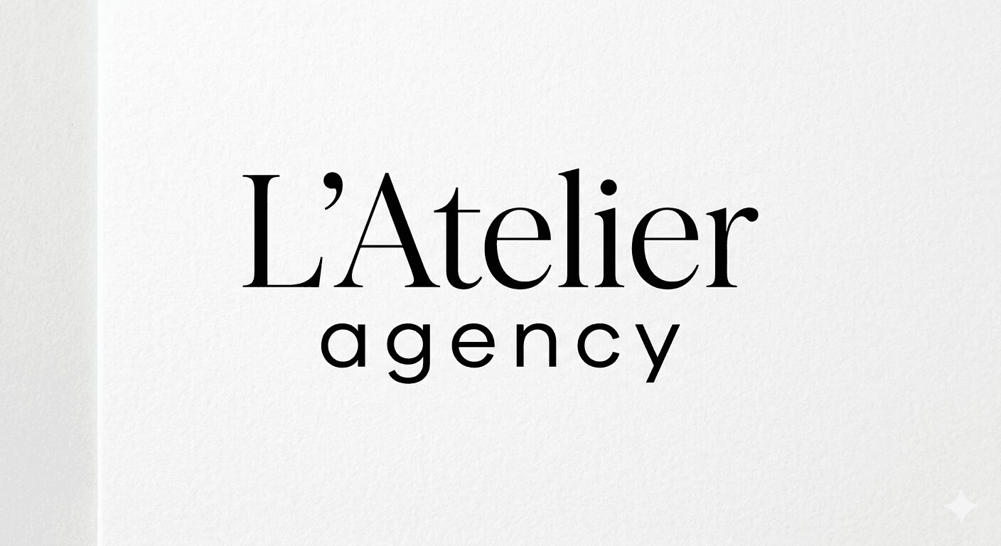 Text logo reading 'L'Atelier agency' on a white background.