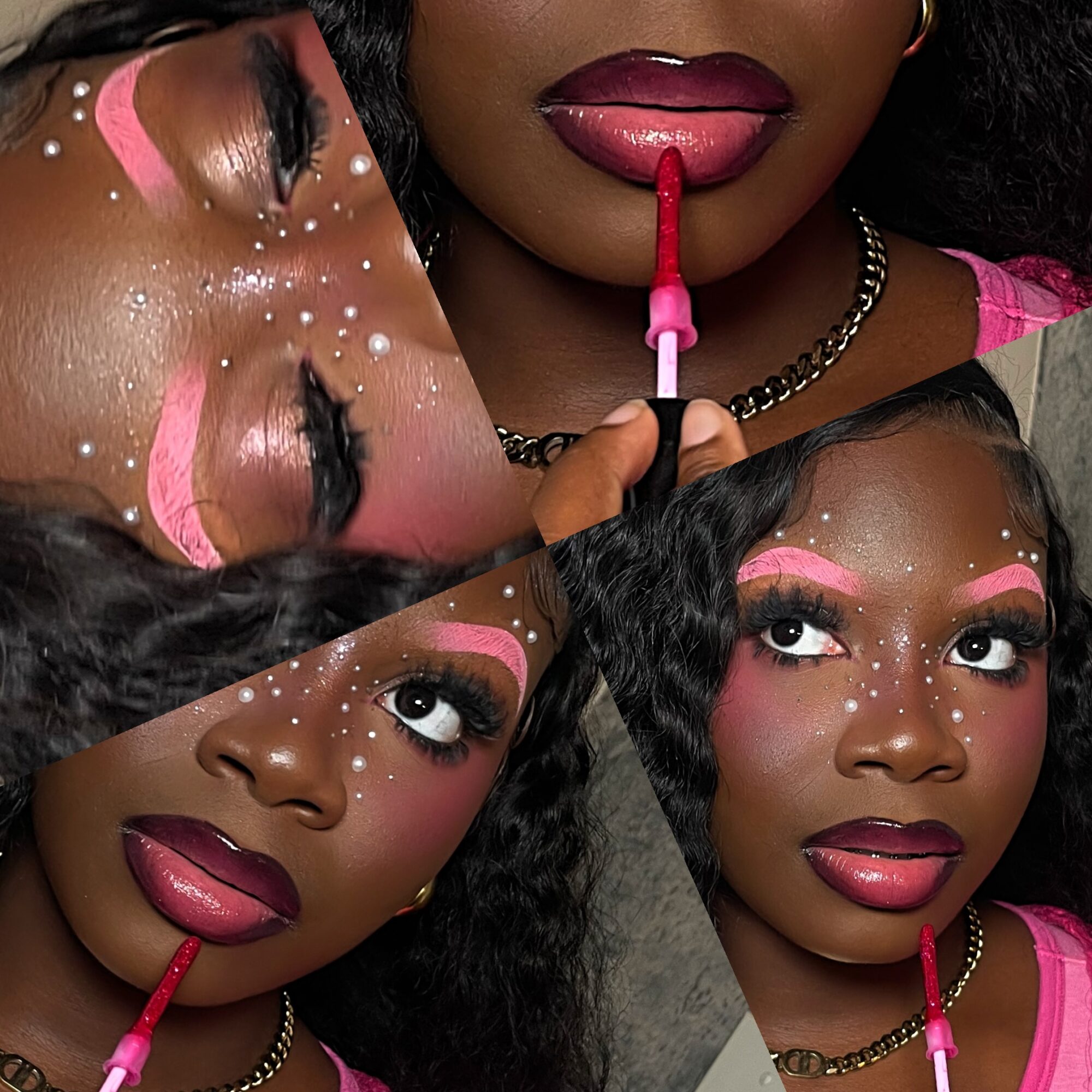 Close-up of a woman applying pink lipstick, with makeup and white dots on her face, wearing a pink top and chain necklace.
