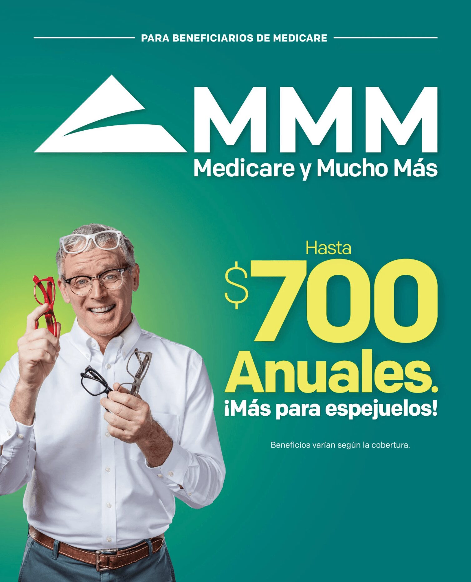 Smiling man with glasses holding a pair of glasses and a small model, promoting Medicare benefits up to 700 annual payments.