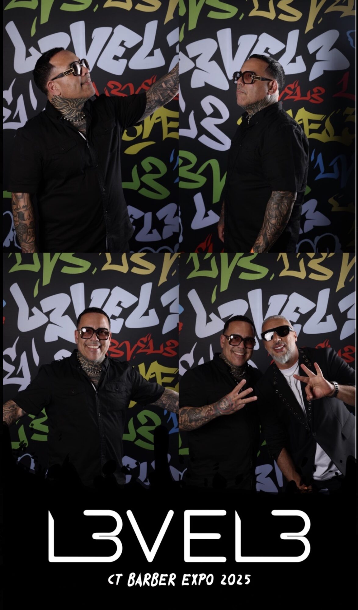 Two men with tattoos and glasses posing in front of a colorful graffiti background at a barber expo, with a logo at the bottom.