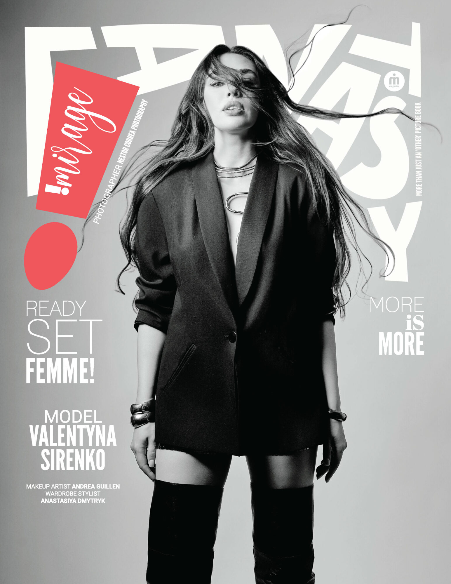 Black and white photo of a woman with long hair wearing a blazer and thigh-high boots, standing confidently.