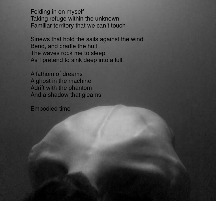 Poem about dreams and reflection over a person's head, with text on the upper left and a head at the bottom.