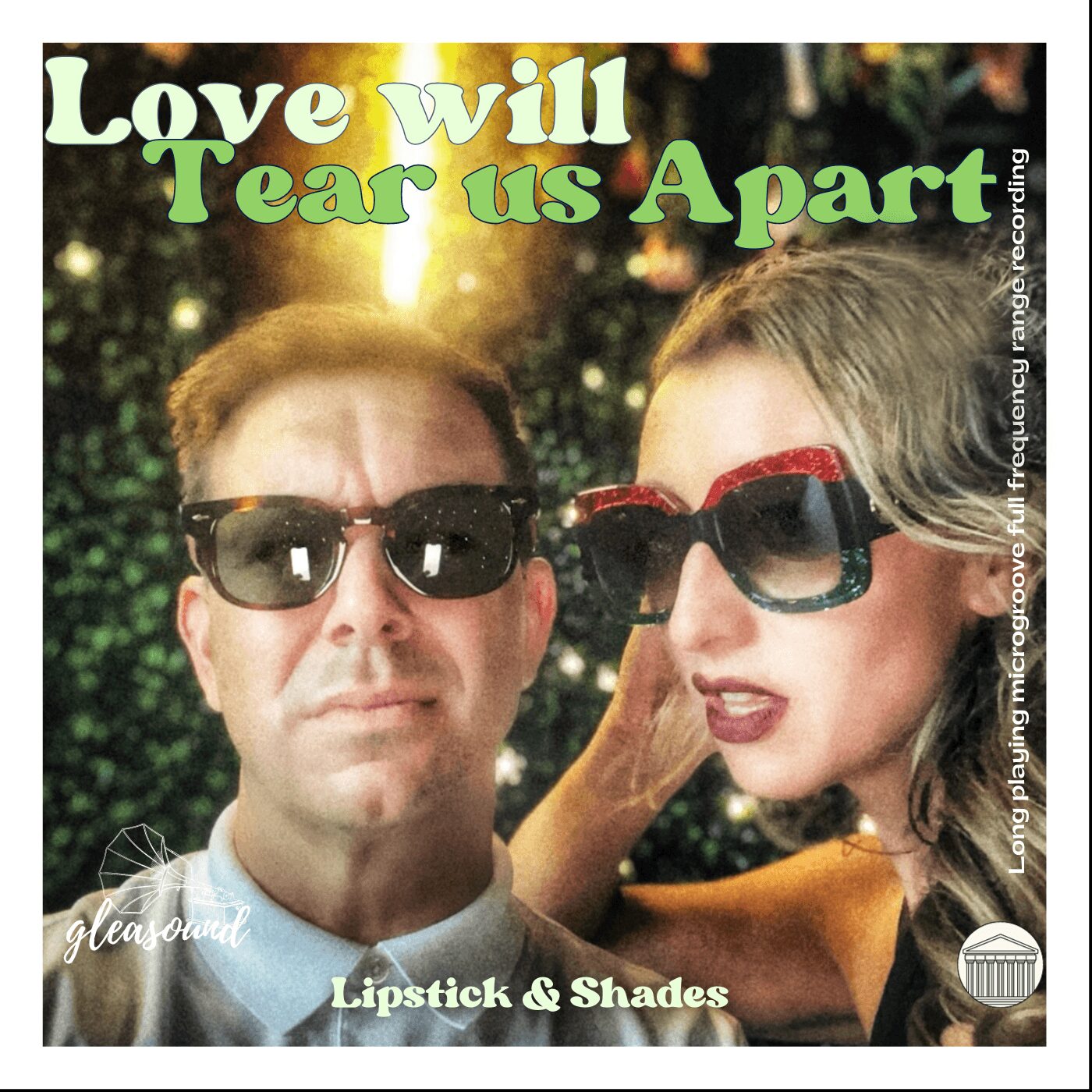 Two people wearing sunglasses outdoors, with text reading