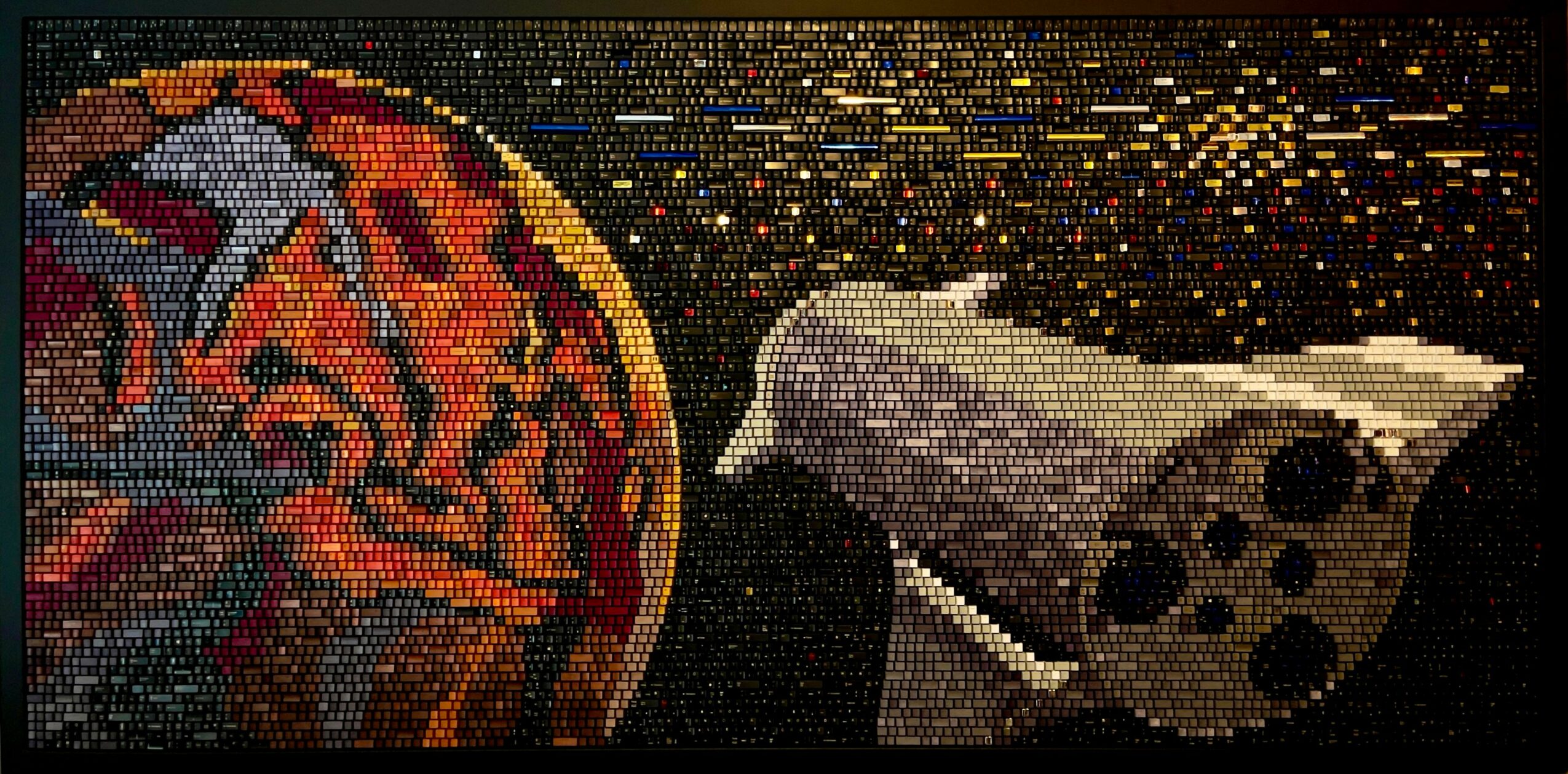 A pixelated depiction of a planet and a spacecraft in space, with stars in the background.