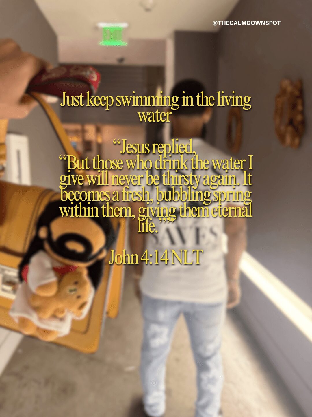 Person holding a yellow object with a background of a person in a white shirt and jeans in an indoor setting. Text overlay quotes from John 4:14 NLT.